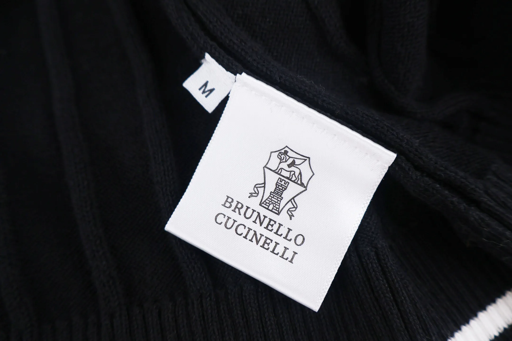 BC Old Money Style Cable Round Neck Knitted Short Sleeve (Black) is pre-shrunk and feels soft and skin-friendly. It has good breathability and warmth retention. It is not easy to pill, deform and fade. It is Versatile with a light Beige tone. The body adopts Classic cable knitting technology. The texture is three-dimensional, full and layered, giving it a retro texture. The Classic round neck is equipped with double-needle reinforced binding, which is durable and not easy to loosen. The cuffs and hem are ribbed in the same color, with moderate elasticity to fit the body shape. The overall shape is a fitted silhouette, with seamless shoulder stitching and straight lines, exquisite hemming technology, complete customized accessories and brand logo details. It is suitable for various wearing scenarios such as daily casual and light business. It is a basic item to create a simple and advanced look. The overall wiring is straight and delicate, the fabric is comfortable and soft, and the color is consistent without color difference. It can be matched with the Same Style to create a fashionable look and control various occasions. Customized accessories, complete with three standards, the Same Style for men and women. Size:S-M-L-XL